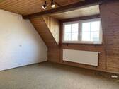 Zimmer im Dachgeschoss - 