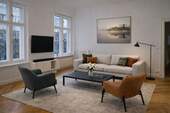 Wohnzimmer - Exklusive 6-Zimmer-Altbauwohnung mit Wintergarten, Loggia & 2 Bädern - ca. 209 m² sanierter Wohnkomfort in ruhiger, begehrter Lage nahe Schloßstraße