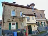 Nordansicht mit Treppenhausanbau und Hofzugang - 