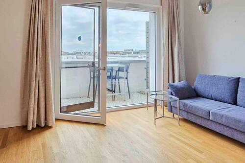 Wohnbereich - Moderne & möblierte 1-Zi. Wohnung mit Dachterrasse und kleinem Wasserblick