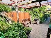 Ihr Lieblingsplatz im Sommer... die Pergola auf der Nordwestseite des Hauses - 