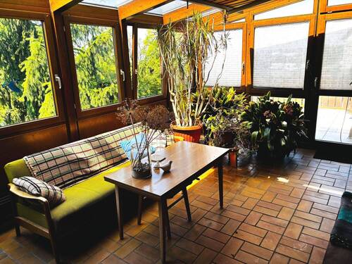 ganzjährig nutzbarer Wintergarten mit angrenzender Dachterrasse - 