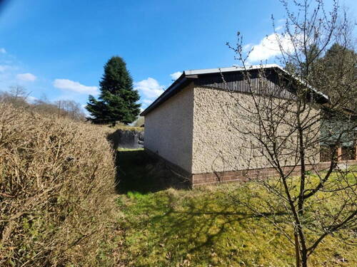 Rückseite Bungalow - 2 Zimmer Mehrfamilienhaus, Wohnhaus zum Kaufen in Groß Lindow