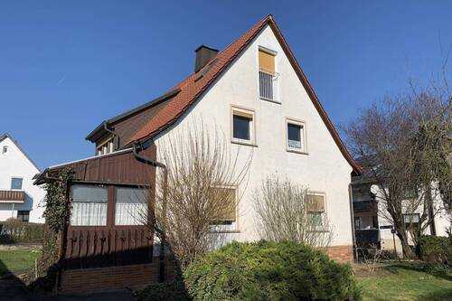 Seitenansicht - Mehrfamilienhaus, Wohnhaus mit 65,00 m&sup2; in Geldersheim zum Kaufen
