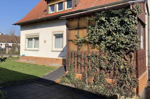 Gartenansicht mit Anbau - 