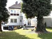 Hausansicht hinten.jpg - 7 Zimmer Mehrfamilienhaus, Wohnhaus zum Kaufen in Gütersloh