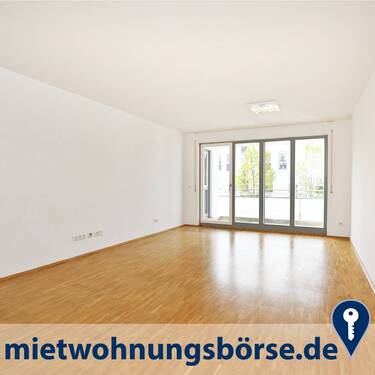 Wohnzimmer - AIGNER - Idyllische 4-Zimmer-Wohnung in der Messestadt Riem!