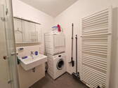 Duschbad mit Waschmaschine - 