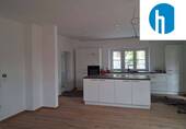 Wohnzimmer - Stilvolle 2-Zimmerwohnung mit Veranda und Kaminofen
