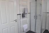 Whg EG Haus links Bad - 