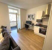 Frei ab sofort 2 - Zimmer-Wohnung im 1. Obergeschoss mit Aufzug Einbauküche Balkon - Bitburg