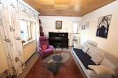 Wohnzimmer Teilansicht - 6 Zimmer Einfamilienhaus in Eschwege