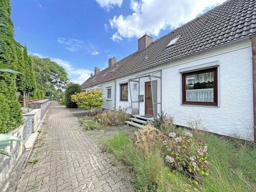 Ansicht - Sarstedt - Gepflegtes Reihenmittelhaus mit Garten & opt. Garage