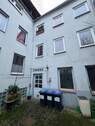 Hinterhof - Mehrfamilienhaus, Wohnhaus zum Kaufen in Lübeck