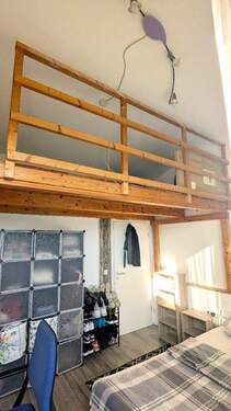 Ein Schlafzimmer mit Empore - 