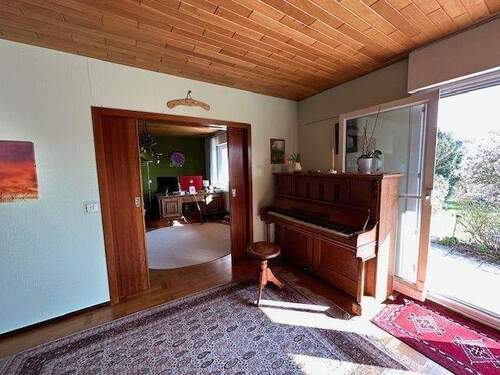 Wohnzimmer und weiteres Zimmer Teilansicht EG - 