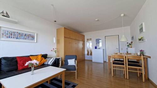 Wohnzimmer Eingang - Etagenwohnung mit 49,00 m&sup2; in Fehmarn zum Kaufen