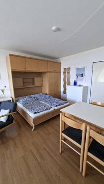 Wohnzimmer mit Wandbett - 