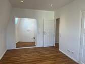 Wohnzimmer mit offener Küche - 