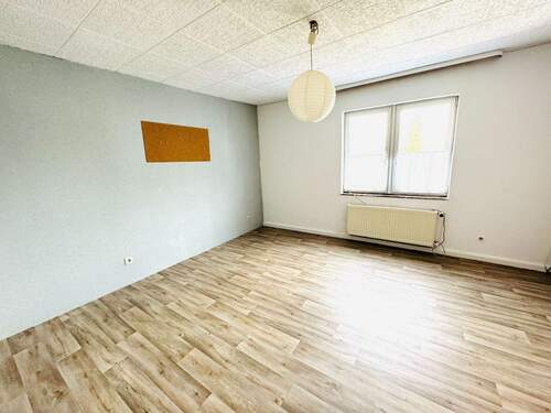 33. Wohnzimmer WE 1.OG rechts - 