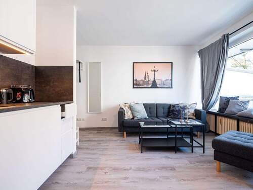 Wohnzimmer mit Küche.jpg - 1 Zimmer Etagenwohnung in Hamburg