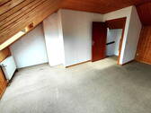 Zimmer im Dachgeschoss - 