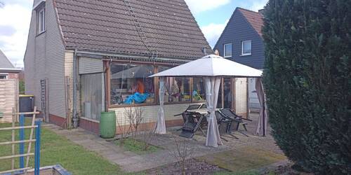 Südseite mit Veranda - 3 Zimmer Einfamilienhaus in Neumünster