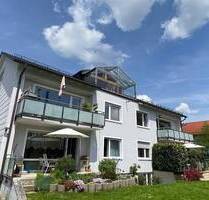 Moderne Dachgeschosswohnung mit Wintergarten in Emmering