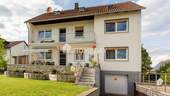 Außenansicht 1 - Voll vermietetes Mehrfamilienhaus mit großem Garten, Terrasse und Loggia in idyllischer Lage