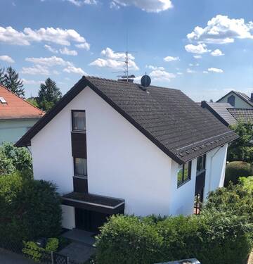 Hausansicht - Solides Einfamilinhaus in guter Lage mit Ausbaupotiential