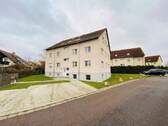 Gebäudeansicht - Mehrfamilienhaus, Wohnhaus zum Kaufen in Rossau