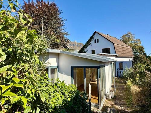 Rückansicht - Entwicklungsobjekt mit 2 möglichen Baugrundstücken