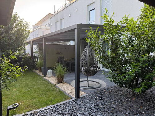 Gartenansicht - Moderne Doppelhaushälfte in Feldrandlage mit überdachter Südterrasse in Nieder-Olm