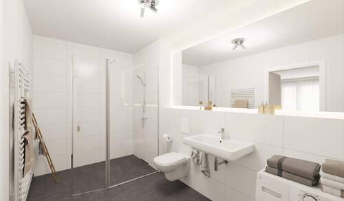 Eines der Badezimmer mit bodengleicher Dusche - 