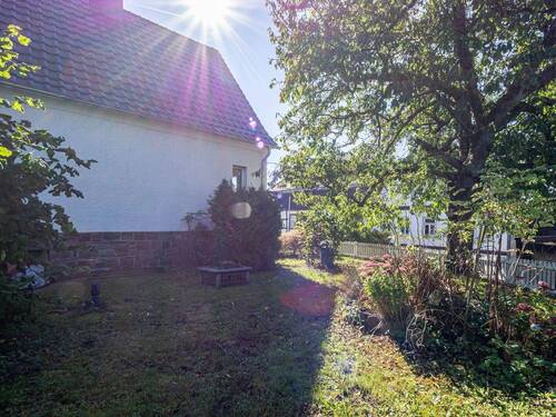 Garten - Einfamilienhaus mit 89,00 m&sup2; in Arnsberg zum Kaufen