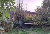 Gartenlounge mit Sonnenuntergang - 
