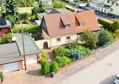Objektvorderseite - Familienfreundliches Zuhause mit begrüntem Garten, Garage und Nebengelass in Wachtendorf !
