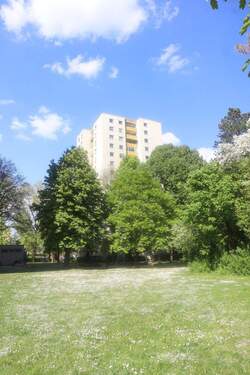 Südansicht Gebäude - Etagenwohnung mit 71,10 m&sup2; in München zum Kaufen