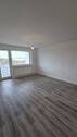Wohnzimmer 1 - Komplett sanierte 3 Zimmer Wohnung mit Balkon in Gelsenkirchen zu vermieten