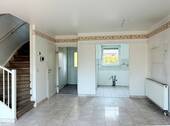 Wohnzimmer - Blick zur Küche.JPG - 3 Zimmer Reihenmittelhaus in Blankenfelde-Mahlow