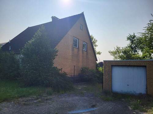Seitenansicht mit Garage - Grundstück in Sassenberg