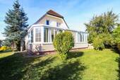 Außenansicht Wintergarten - 8 Zimmer Einfamilienhaus zum Kaufen in Groß Pankow (Prignitz)