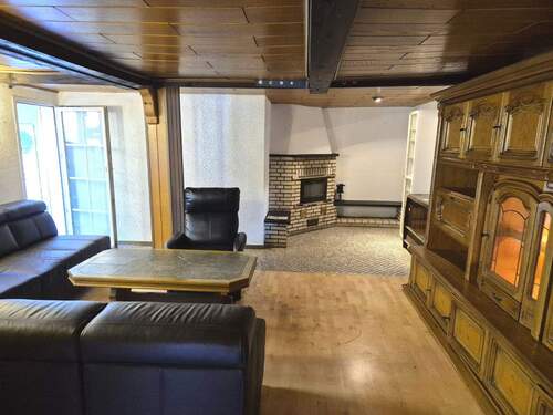 Wohnbereich mit Kaminofen - Einfamilienhaus mit 130,00 m&sup2; in Dreieich zum Kaufen