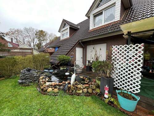 Gartenansicht - 8 Zimmer Mehrfamilienhaus, Wohnhaus zum Kaufen in Westerstede