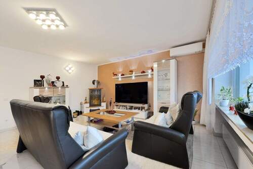 der Wohnbereich mit dem Kaminofen - Doppelhaushälfte mit 108,00 m&sup2; in Moers zum Kaufen