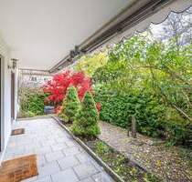 AIGNER - Charmante Erdgeschosswohnung am Athener Platz: Wohnen auf einer Ebene mit privater Terrasse - München Untergiesing-Harlaching