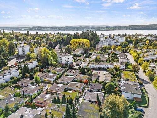 Luftbild - Stadt und See - 