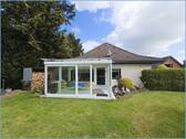 Gartenansicht mit Wintergarten - Einfamilienhaus mit 143,00 m&sup2; in Bornheim zum Kaufen