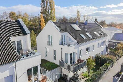 Rückansicht auf Haus - Das perfekte Zusammenspiel aus Business, Balance und Behaglichkeit