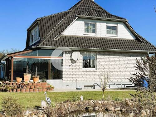 Seitenansicht - Einfamilienhaus mit 230,00 m&sup2; in Dedelstorf zum Kaufen